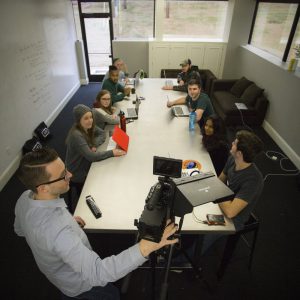 film students sitting around table