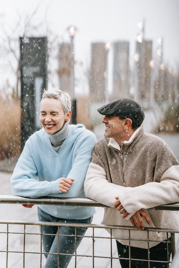 Couple embracing other in snow hi-res stock photography and images - Alamy