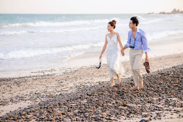 Beautiful loving couple posing walking outdoors in park nature take selfie  by mobile phone. Stock Photo | Adobe Stock