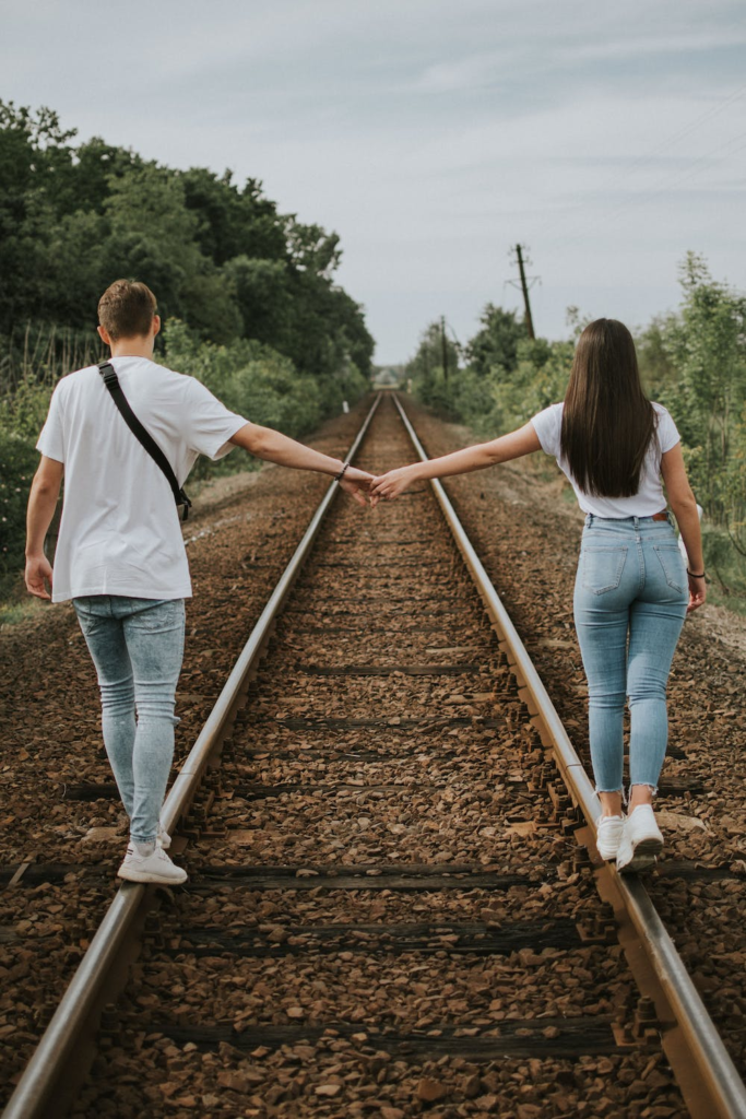 Premium Photo | Caucasian teenager posing near on railway track