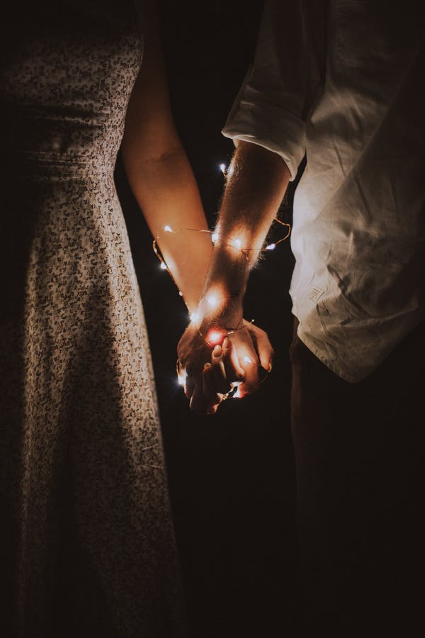 Man and woman holding hands photo – Free Finger Image on Unsplash